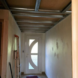 pose d'une porte d'entrée de qualité et de fabrication artisanale