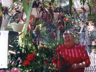 A picture of Paul Hozwarth in his greenhouse