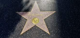 John Wayne's star on the Walk of Fame is on 1541 Vine Street, in the neighborhood of the original CBS Playhouse Theatre where he had performed several times.