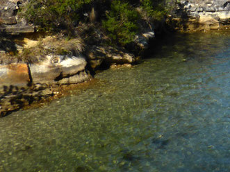 Snug Beach water and sandstone