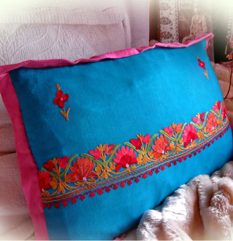 Deep, topaz-blue, pashmina-shawl chusion cover, with bright, floral embroidery & berry-pink, super-soft, pashmina edging