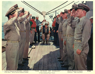 Spig's Goodbye: the final scene of "Wings of Eagles" was shot on the aircraft carrier U.S.S. Philippine Sea. Note that John Wayne wears the same jacket that he wore throughout "They Were Expandable" as a personal salut to the film's writer, Spig Wead.