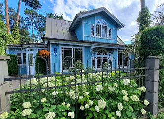 Blue timber cottage in Jūrmala, Latvia