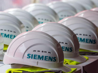 Experten gehen davon aus, dass sich Siemens in einem herausfordernden Umfeld zuletzt ganz gut geschlagen hat. Foto: Jens Büttner/Archiv