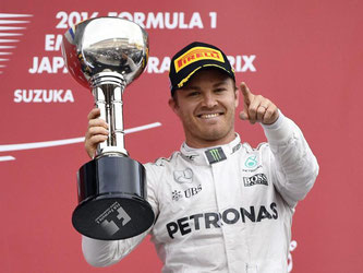 Nico Rosberg jubelt über seinen Sieg beim Großen Preis von Japan. Foto: Franck Robichon