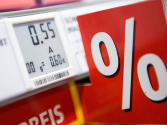 Ein elektronisches Preisschild in einem Supermarkt. Foto: Marius Becker/Symbolbild