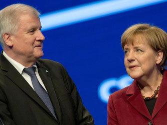 Angela Merkel (CDU) und Horst Seehofer (CSU). Foto: Sven Hoppe/Archiv