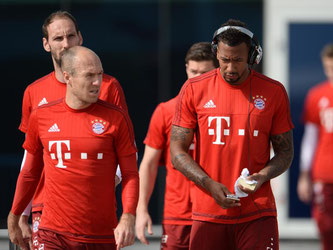 Arjen Robben (l) und Jérôme Boateng könnten wieder für die Bayern auflaufen. Foto: Andreas Gebert