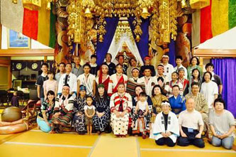 Tanimura joins a photo session after participating in an event aimed to promote mutual understanding between Ainu people and members of  native tribes from Taiwan.