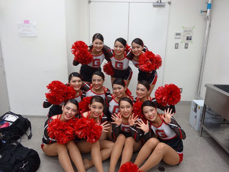 Members of Garnet Girls pose for a picture prior to their performance at a competition. 