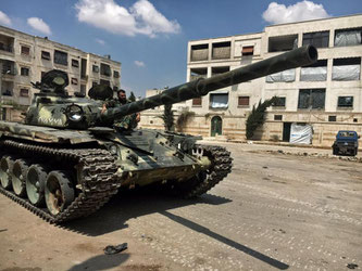 Ein syrischer T-72-Panzer lauert in einer Kampfpause in Aleppo. Foto: Michael Alaeddin/Sputnik