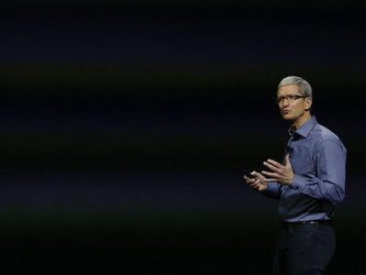 Apple-Konzernchef Tim Cook spricht über die neue Fernseh-Box Apple TV. Foto: Monica Davey