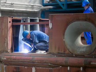 Steigende Lohnkosten verteuern die Arbeit in Deutschland. Foto: Hannibal