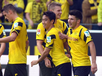 Shinji Kagawa (M) erzielte bei seinem BVB-Comeback das 2:0 gegen den SC Freiburg. Foto: Matthias Balk