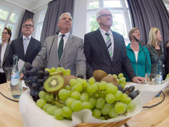Politiker der grün-schwarzen Koalition in Baden-Württemberg. Foto: Marijan Murat/Archiv