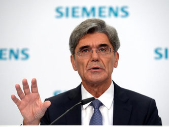 Siemens-Chef Joe Kaeser. Die Kosten für den tiefgreifenden Konzernumbau dürften den Gewinn belastet haben. Foto: Rainer Jensen/Archiv