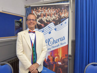 Martin, Music Director of the Wessex Chorus conducting the choir.