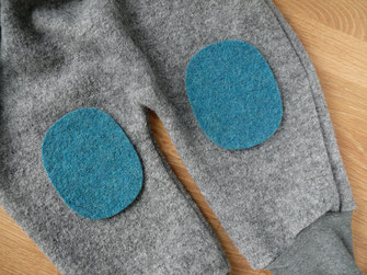 eine wollwalkhose wurde mit Wollflicken repariert