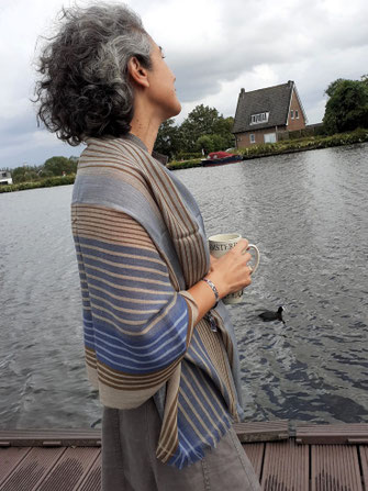 Lightweight wool shawl, woman outdoor styled.