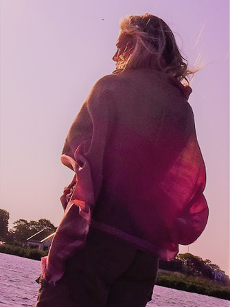 Woman wrapped with wool and silk shawl