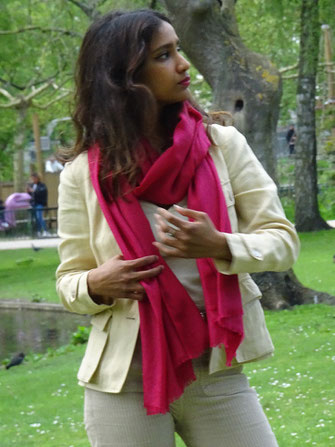 Unicolor shawl made of wool and silk, color carmin, styled.