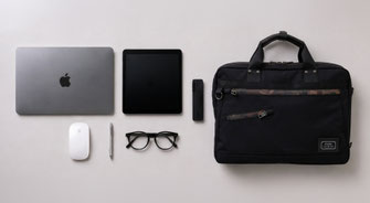 Laptop, tablet, and ETUBY business bag arranged for everyday carry