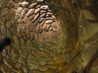 Tholos, die als Raumdecke und Turmabschluss dient