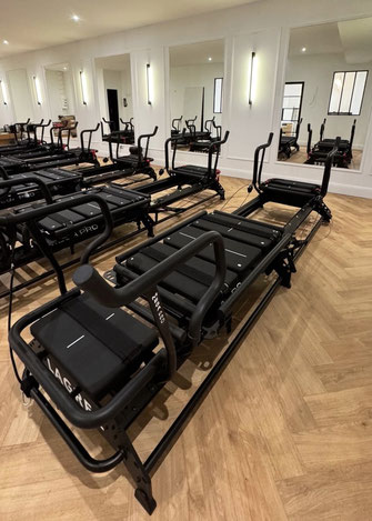 salle de sport pilate reformer pilates bordeaux black milk studio sport architecte d'intérieur décoratrice popsy deco