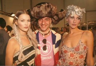 Fashion designer John Galliano and top model Kate Moss during Paris Fashion Week's Ready-to-Wear Spring/Summer 1994 fashion show