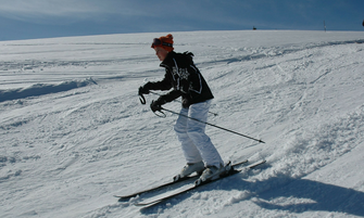 Young girl skiing