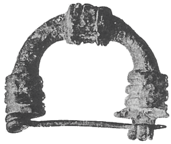 Fig. 1790. Length 5.1 cm. Height 4.1 cm. Completely preserved but corroded. The center band at the top has a fine transverse ...