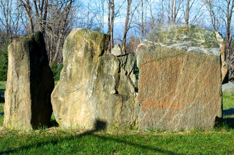 The sighting ring stone is in the center, with the ring in its top right.