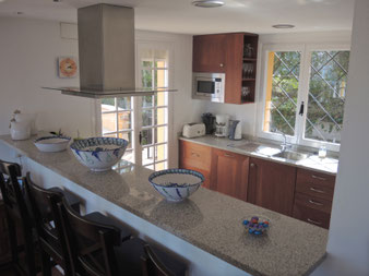 Our kitchen is very well equipped with everything a cook wil need. The open floor plan allows you to take in the views and talk to your friends and family.