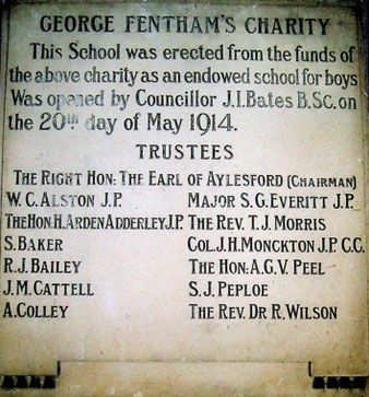 Stone commemorating opening of new boys' school