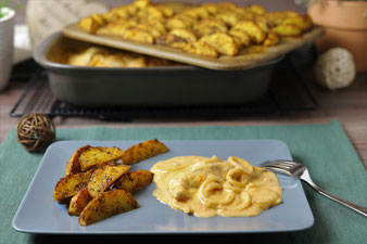 Hähnchen in Zwiebel-Sahne-Soße in der Ofenhexe mit Wedges vom Zauberstein