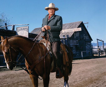 MGM built the movie town of Bucksin Joe in 1957, west of Canon City. It was formed with 100-year-old log buildings from the frontier. John Wayne shot one scene for "The Cowboys" here, when he is trying to locate hands for his trail drive.