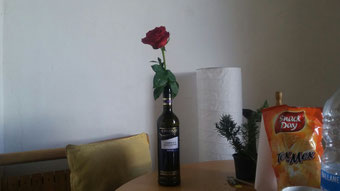 Beautiful rose in the chilenio wine bottle 