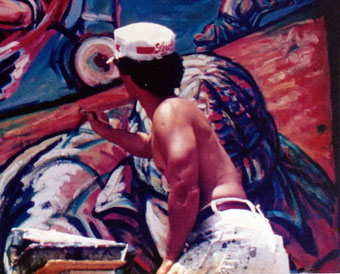 George Yepes, 21 years old, painting murals in East Los Angeles, California USA