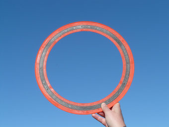 frisbee aerobie urlaub italien strand wurfobjekt spaß fun boomerang