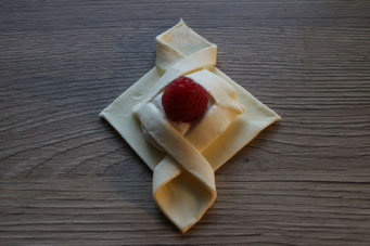 puff pastry square with cream cheese filling and raspberry