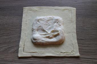 puff pastry square with cream cheese filling