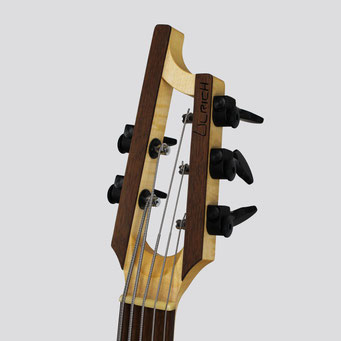 A modern custom bassguitar with a slotted head. this great construction method traces back to the spanish guitar. handmade by a german master luthier