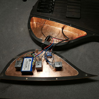 A mastercrafted Ulrich bassguitar with a noll 4 band equalizer mounted in a shielded housing