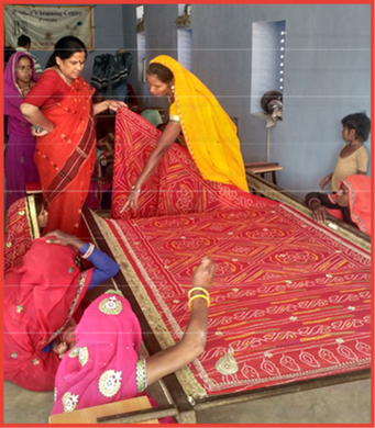 Women entrepreneurs doing embroidery work at their training center established in village Pawata  