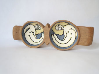 Twins, 2020, cm25x9, acrylic on hand-carved walnut plate.