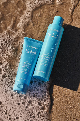 Hair & Body Shampoo, Bild Tube am Strand, vom Meerwasser umspült