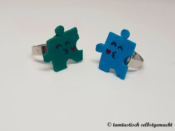 Ringe-Puzzleteile-mit-Küsschen-blaugrün-hellblau