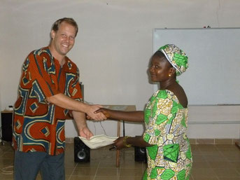 Eric awarding certificates at the graduation ceremony