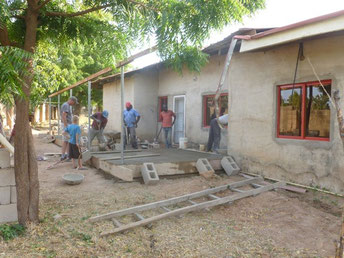 Our church raised money for a screened-in porch at the back of our house. There are more pictures below.