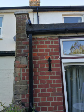Photograph of the end of a single-storey extension on the boundary